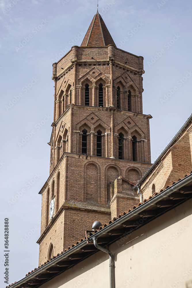 Gothic church of Saint Nicolas (XIV century) with octagonal tower is located in Saint Cyprien neighborhood on the west side of the Garonne River. Toulouse, Haute-Garonne, France. 