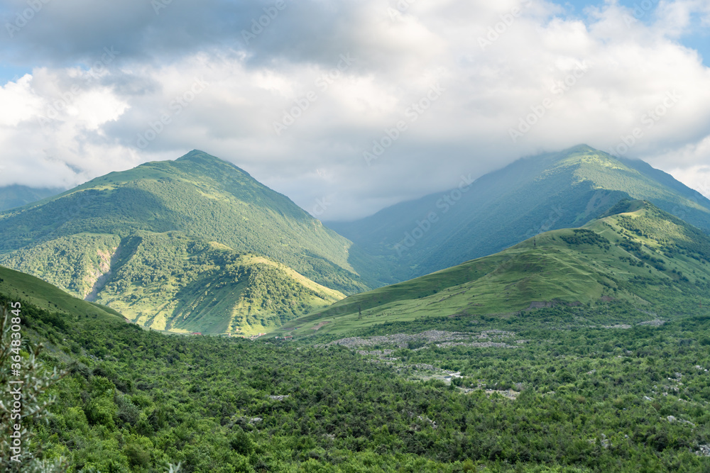 Fantastic view of mountains in north ossetia with cloudy sky.