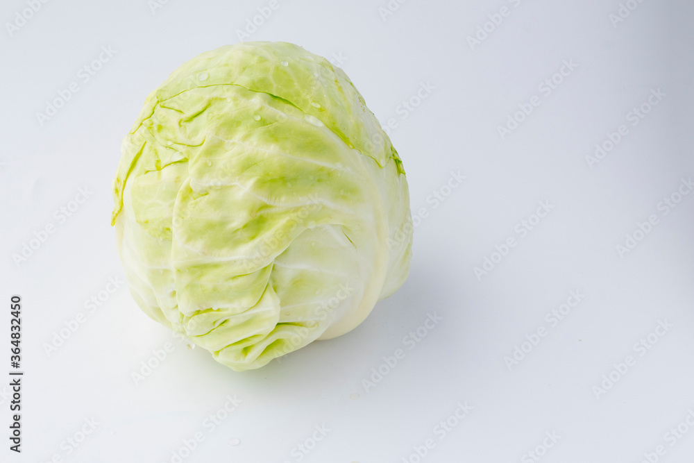 White background. A head of white cabbage. No isolation. Eco product White background. A head of white cabbage. No isolation. Eco product
