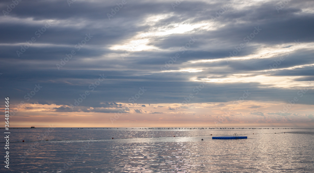 cloudy sunset over adriatic sea surface cloudy sunset over adriatic sea surface