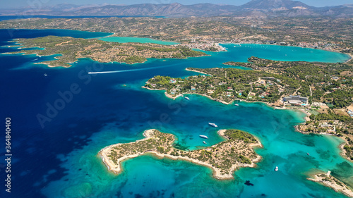 Aerial drone photo of Chinitsa bay a popular anchorage crystal clear turquoise sea bay for yachts and sail boats next to Porto Heli, Saronic gulf, Greece photo