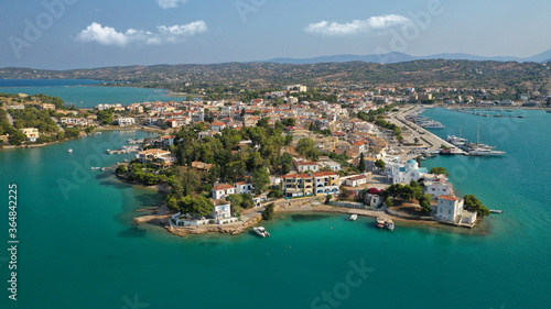 Aerial drone photo of famous fjord seaside village and bay of Porto Heli in the heart of Argolida prefecture, Peloponnese, Greece © aerial-drone