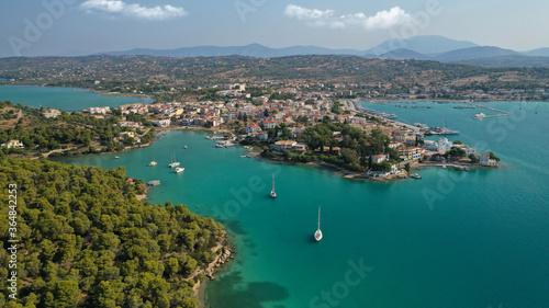 Aerial drone photo of famous fjord seaside village and bay of Porto Heli in the heart of Argolida prefecture, Peloponnese, Greece