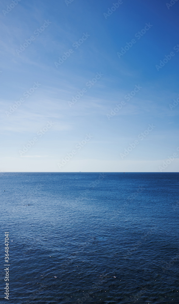 Ntural ocean landscape with view from the pool. Blue water and sky Ntural ocean landscape with view from the pool. Blue water and sky