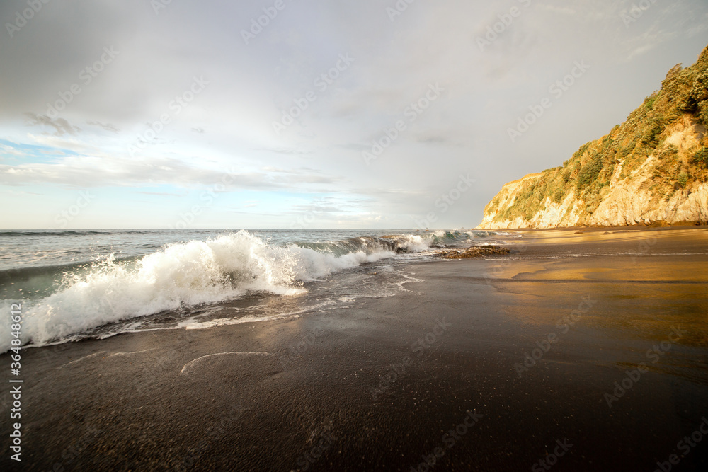 Obraz premium Black sand beach sunset 9