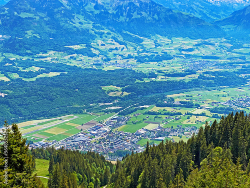 View of the fertile valley with settlemens between the Lakes Alpnachersee and Sarnersee from the Pilatus massif, Alpnach - Canton of Obwalden, Switzerland (Kanton Obwalden, Schweiz) photo