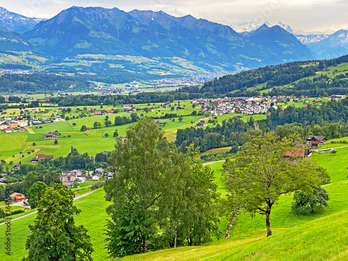 View of the fertile valley with settlemens between the Lakes Alpnachersee and Sarnersee from the Pilatus massif, Alpnach - Canton of Obwalden, Switzerland (Kanton Obwalden, Schweiz) photo