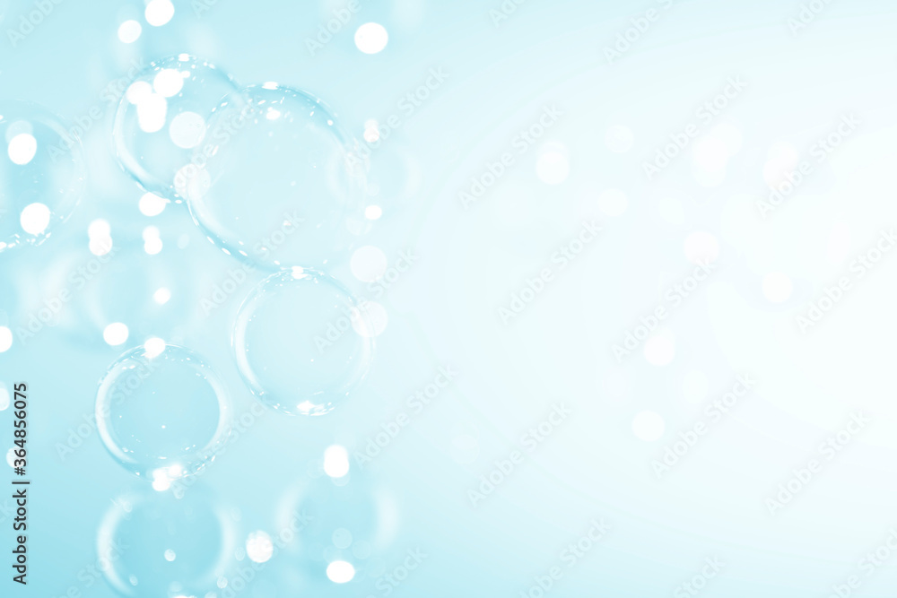 Beautiful clear soap bubbles float on blue background. Beautiful clear soap bubbles float on blue background.