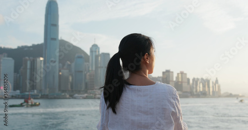Photography Woman looks at city in Hong Kong