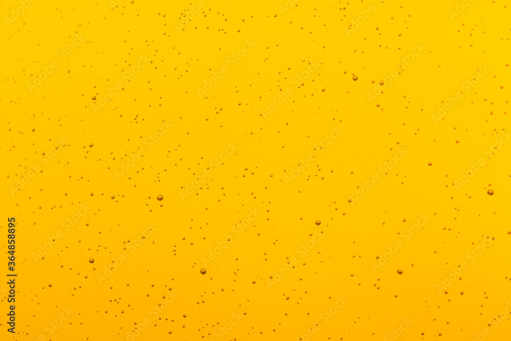Raindrops on a yellow background. Raindrops on a yellow background.