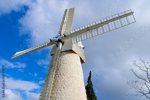 Wallpaper Mural Windmill under clouds Torontodigital.ca