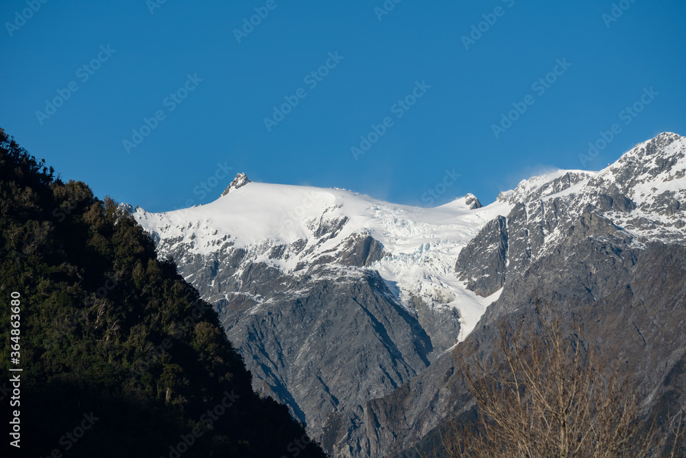 Mountain ranges and peaks as seen from the Franz Josef region of New Zealand	
