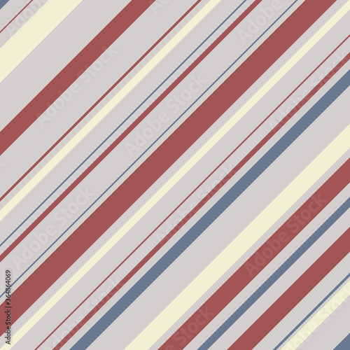 Geometry, abstract background. Diagonal stripes of dark red, blue, yellow in different sizes on the same background. Modern wallpaper.