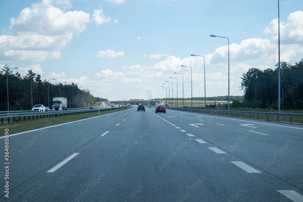 Łódź, Poland , July 4, 2020, Cars approaching slip lane near Lódź, Poland