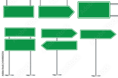 Road green sign. Street empty sign from the boards. Traffic direction indicator. Empty signboards in the form of sterlok. Stock Photo.