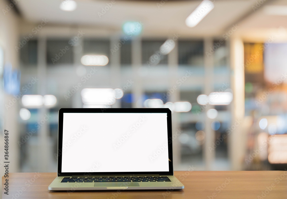 laptop on table in the office background. laptop on table in the office background.