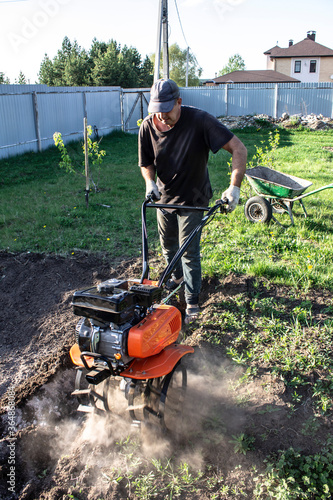 man plowing land tillers, gardening and farming