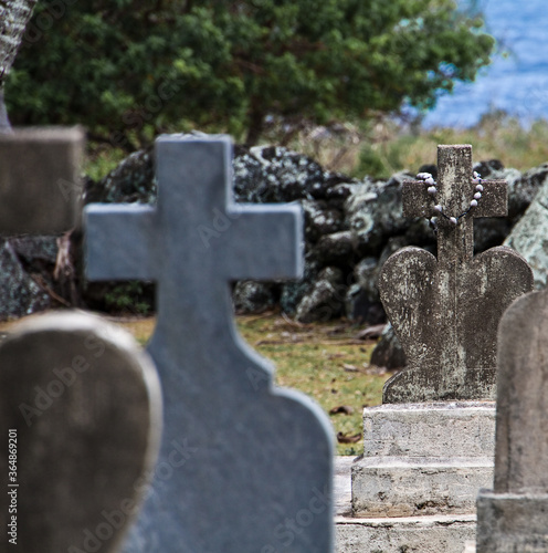 Grave Sites at St. Philomena Roman Catholic Church in Kalawao, Kalaupapa Peninsula, Molokai, Hawaii, USA