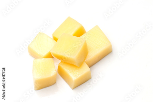 Close Up of Mozzarella Cheese Cubes Isolated on White Background