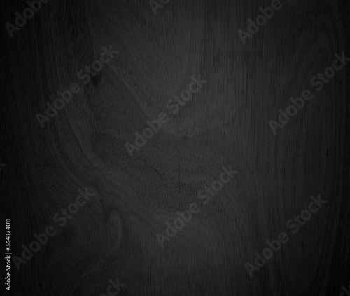 Close-up corner of wood grain Beautiful natural black abstract background Blank for design and require a black wood grain backdrop