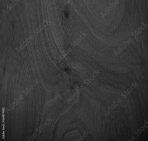 Close-up corner of wood grain Beautiful natural black abstract background Blank for design and require a black wood grain backdrop