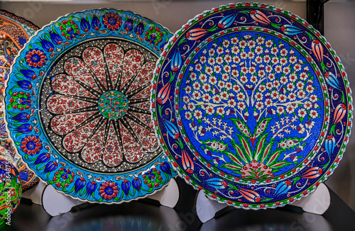 Montenegrin hand painted decorative plates with a floral pattern in at a souvenir shop in Kotor old town in Montenegro photo