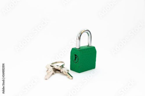 padlock with keys on white background