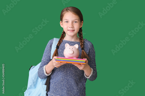Girl with savings for educa...