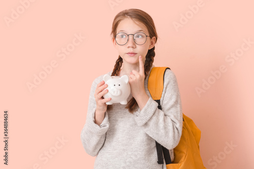 Thoughtful girl with saving...