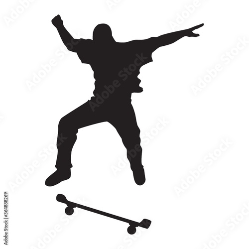 silhouette of man with skateboard