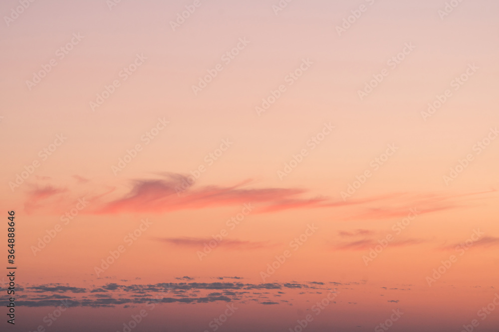 Sunset sky with soft clouds