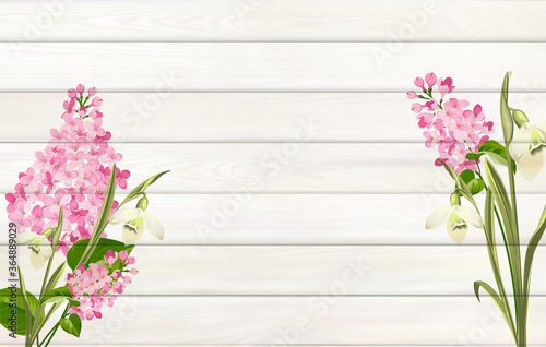 Lilac background for your design. Flower leaves on wooden background with empty space