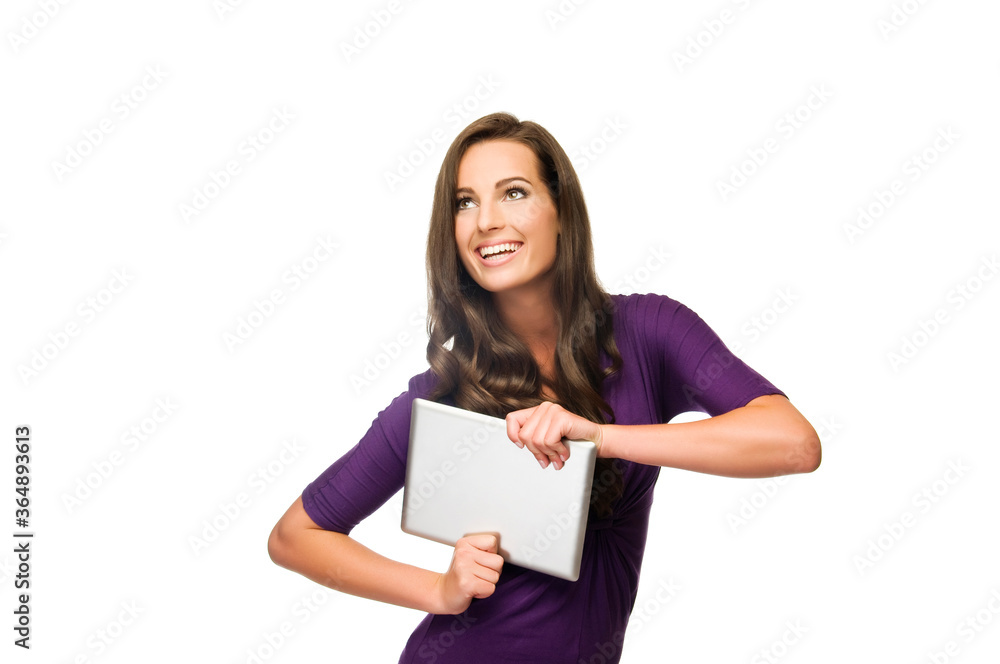 Portrait of a smiling beautiful woman holding tablet computer isolated on a white background. Looking up. Portrait of a smiling beautiful woman holding tablet computer isolated on a white background. Looking up.