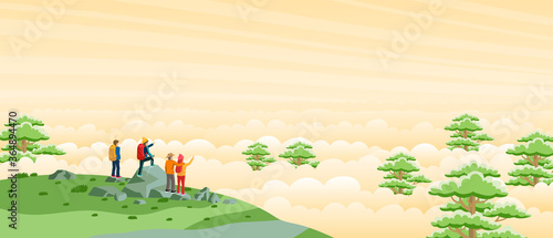 Travelers come to the top of a mountain to watch the morning mist.