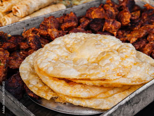 Crispy fried Naan bread or Roti in India, Bangladesh or Sri Lanka. Indian street food