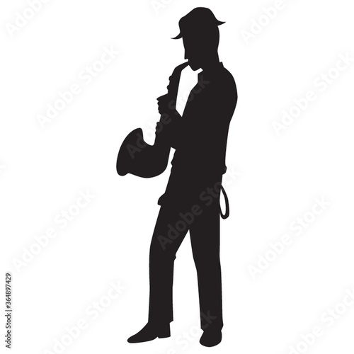 silhouette of man playing saxophone