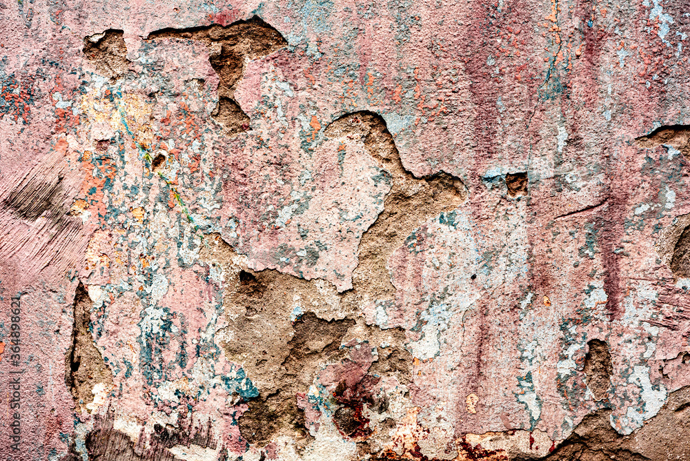 Texture of a concrete wall with cracks and scratches which can be used as a background Texture of a concrete wall with cracks and scratches which can be used as a background