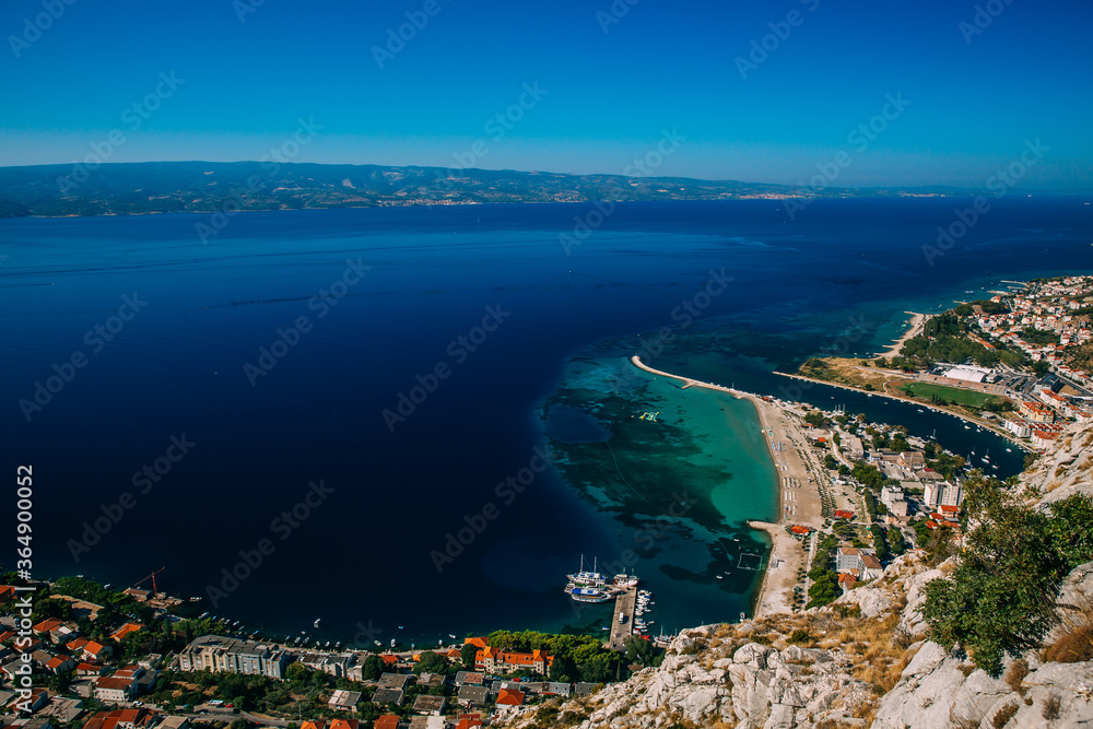 Fototapeta premium Beautiful city of Omis, Croatia seen from the Stari Grad fortress. 