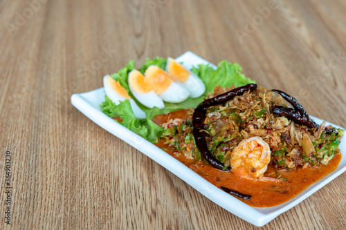 Winged Bean Salad on table in restaurant. Thai food.