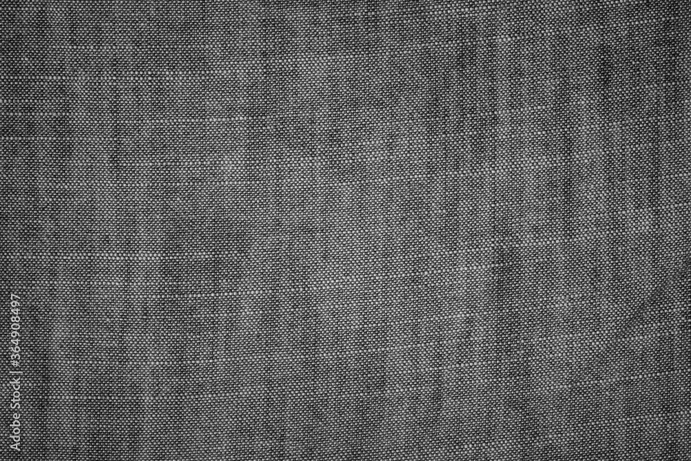 Fototapeta premium Black jeans texture or background with visible fibers