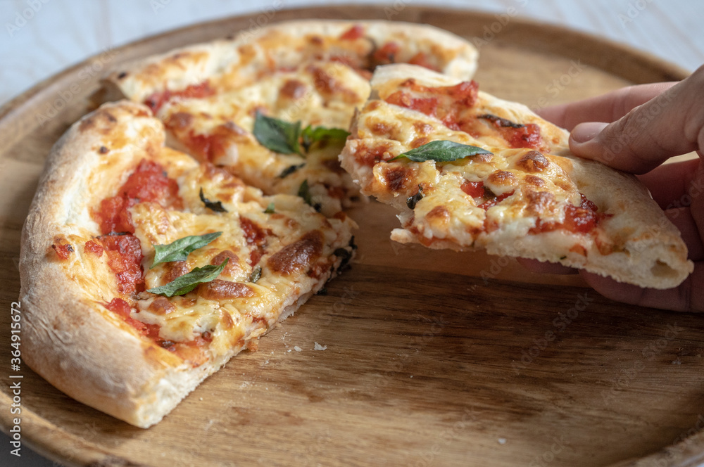 classic pizza margherita with mozzarella and basil, make pizza at home