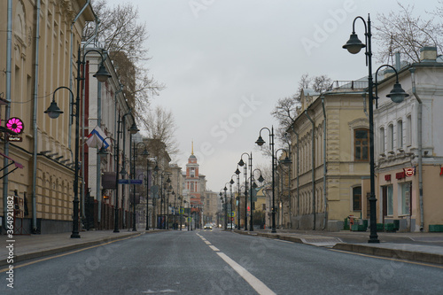 Moscow street in the spring day. Almost nobody. Almost no traffic. Coronavirus pandemic time. Lockdown lifestyle. © Yury and Tanya