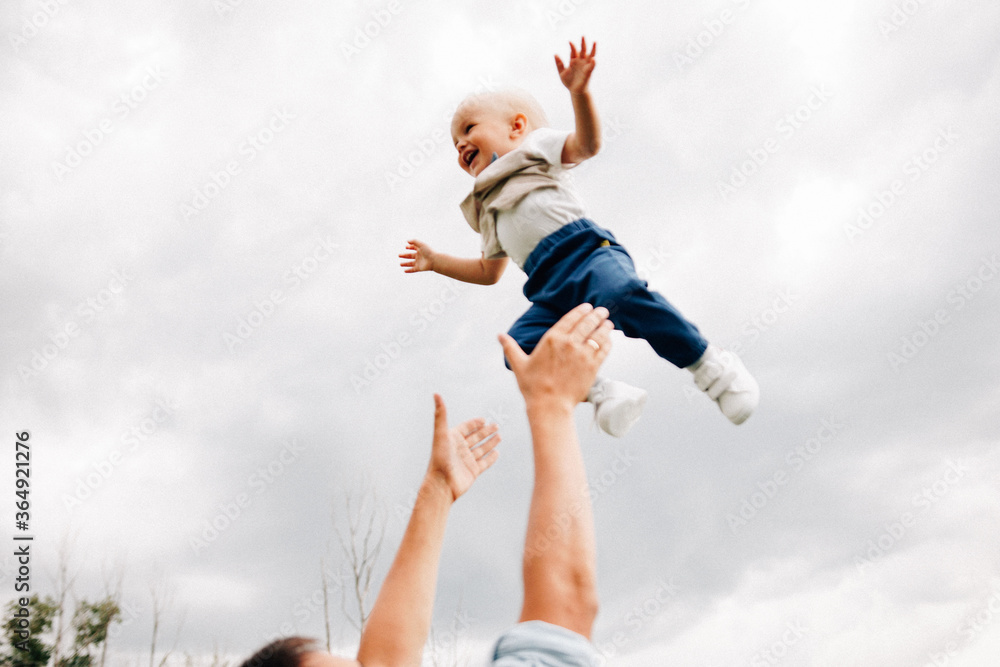 A happy family walks with a child in nature A happy family walks with a child in nature