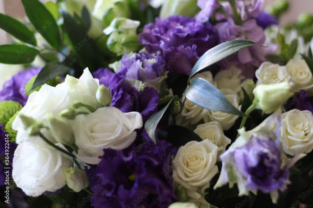 Fototapeta premium Beautiful bouquet of beautiful flowers. White roses in blossom. Birthday cards