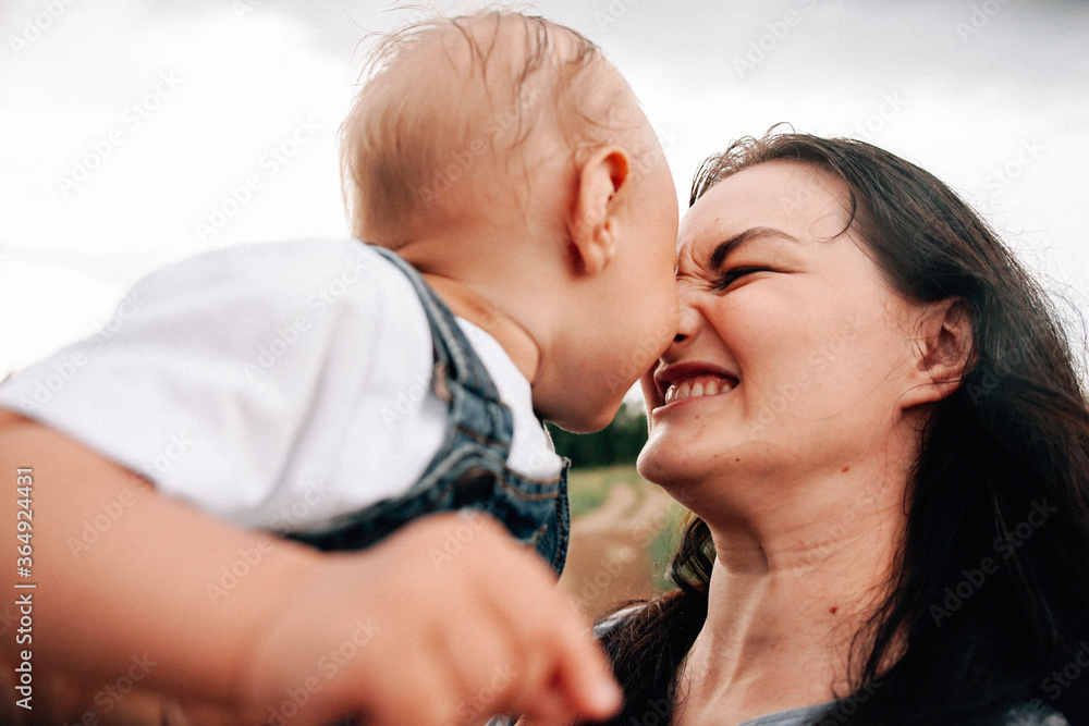 A happy family walks with a child in nature A happy family walks with a child in nature