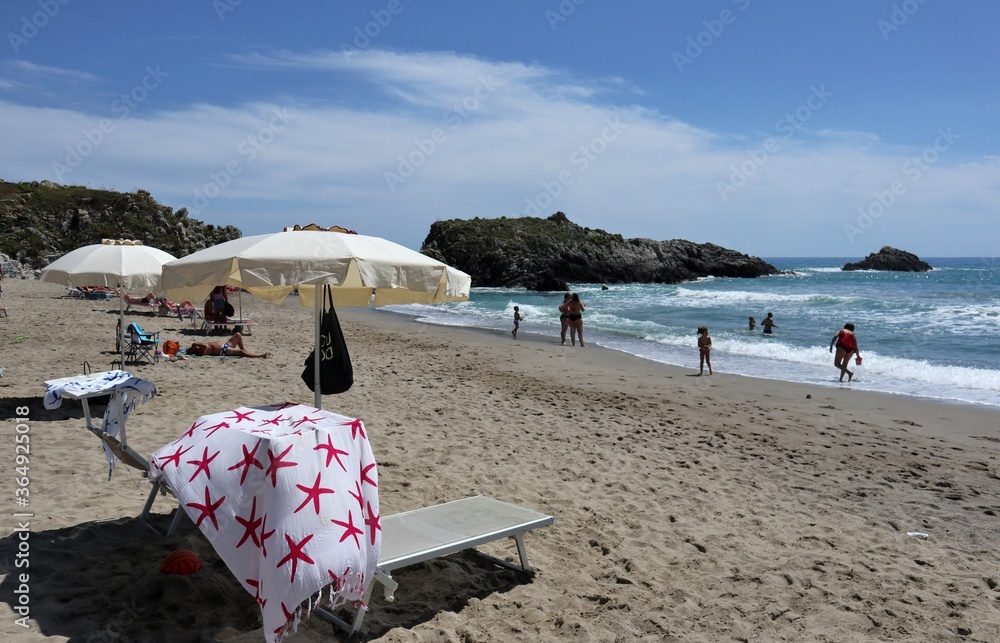 Ascea Marina - Ombrelloni sulla spiaggia di Punta del Telegrafo Stock Photo  | Adobe Stock