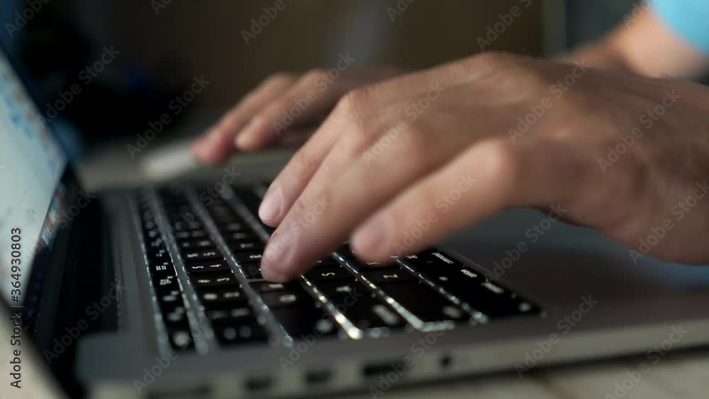 Hands typing on keyboard. Working from home. Businessman using laptop computer. Online internet marketing, freelance, working from home. Hands typing on keyboard. Working from home. Businessman using laptop computer. Online internet marketing, freelance, working from home.