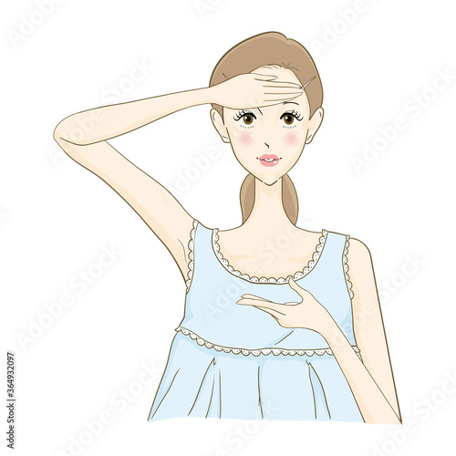 化粧品を塗る女性　おでこ