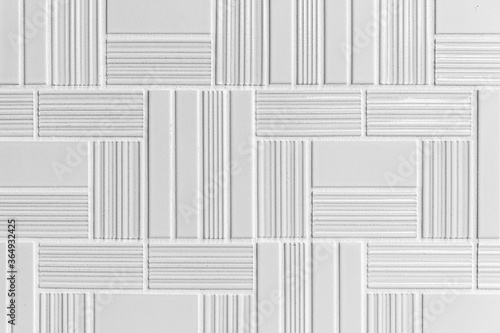 Modern white stone wall with stripes texture and seamless background