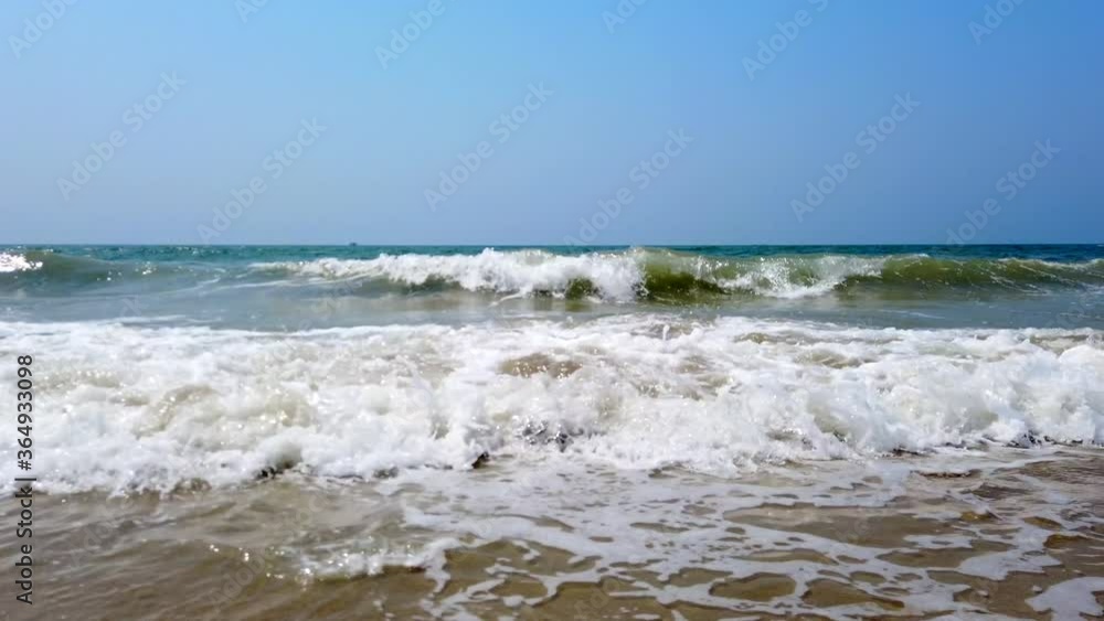 Waves crashing on a vacant beach Waves crashing on a vacant beach